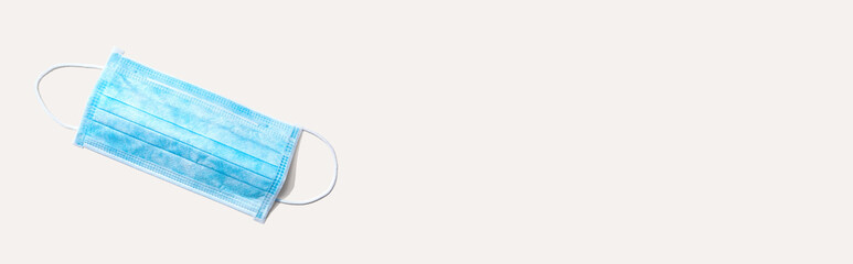 blue surgical mask overhead view - flat lay