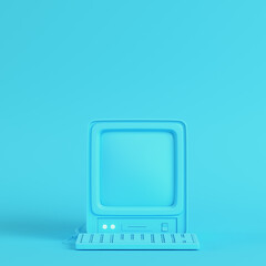 retro computer on bright blue background in pastel colors