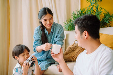 Asian family spending time together at home.