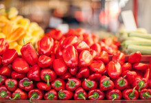 Fresh Organic Red Peppers On A Market.