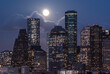 Full moon and office lights of downtown Houston at night
