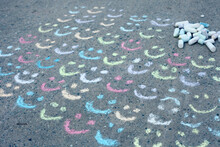Tons Of Chalk Smiles And One Frown On The Driveway