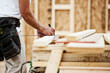 © Sean Locke Photography/Stocksy - Construction: Using a T-Square to Mark Wood