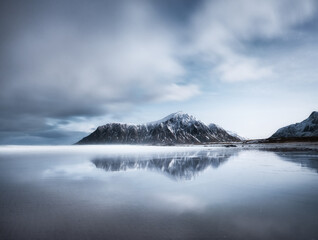 Wall Mural - skagsanden beach, lofoten islands, norway. mountains, beach and clouds. long exposure shot. night ti