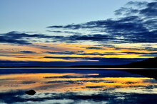 Fabulous Mirror Sunset. Lake Keret, Northern Karelia, Russia