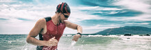 Triathlon Competition Swimmer Man Swimming Looking At Heart Rate Monitor Tracker Smartwatch. Panoramic Banner. Outdoor Sports.