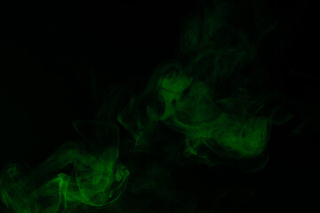 Green steam on a black background.