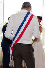 Wall Mural - French mayor with scarf france flag tricolor during weeding celebration in France