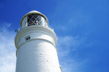 Wales Nash Point Lighthouse On A Blue Sky