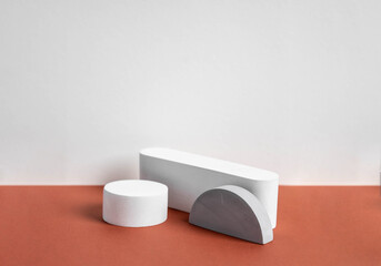 Fototapete - concrete podium on earthy tone background. Pedestal, place for product