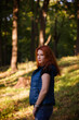 © Ксения Куприянова - portrait of a young red-haired girl in the park