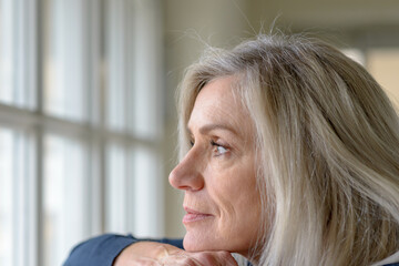 Wall Mural - Pretty thoughtful woman with serious expression