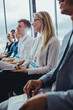 © Jacob Lund - Group of business people sitting at seminar