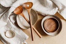 Modern Minimalist Ceramics Set Over A Linen Cloth. Natural Products Or Food Concept, Top View, Flat Lay.
