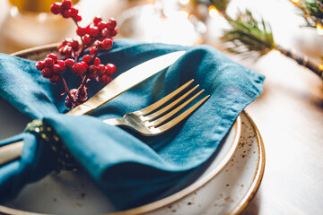 Wall Mural - Festive table setting with winter decor. The concept of Thanksgiving or Christmas family dinner.