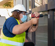 © Kiko Photos - WOMAN WORKING ON THE REFORM OF AN OLD HOTEL AT TENERIFE ISLAND