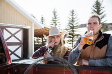 Ranchers Drinking Beer At Truck  Bed