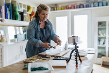 Female Artist Vlogging Mosaic Art Class In Home Studio