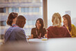© Tom Merton/Caia Image - Smiling business people meeting in office