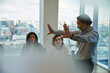 © Chris Ryan/Caia Image - Businessman leading conference room meeting