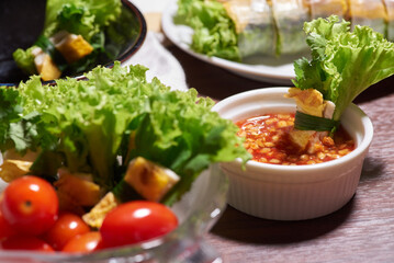 Colorful and healthy salad roll with fresh tomato