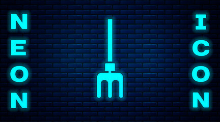 Sticker - Glowing neon Garden rake icon isolated on brick wall background. Tool for horticulture, agriculture, farming. Ground cultivator. Vector Illustration.