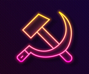 Wall Mural - Glowing neon line Hammer and sickle USSR icon isolated on black background. Symbol Soviet Union. Vector.