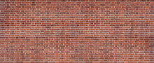 Panoramic Background Of Wide Old Red And Brown Brick Wall Texture. Home Or Office Design Backdrop.