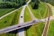 aerial top view of a multi-level highway and railroad crossing, Skulte, Latvia