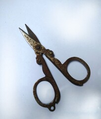 old small foldable rusty scissors