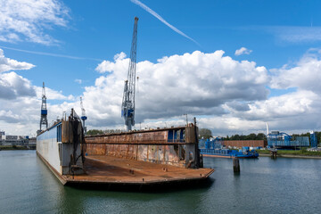 Floating dry dock with cranes in the port of rotterdam