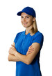 © ronstik - young woman in blue polo shirt and hat with arms crossed isolated on white background