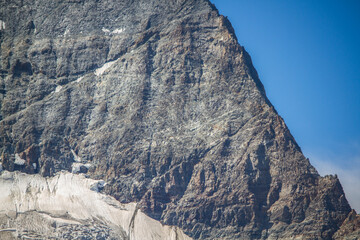 Close-up of Matterhorn mountain eastern wall showing huge rift (summer)