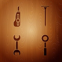 Set Wrench spanner, Stationery knife, Wrench spanner and Metallic nail on wooden background. Vector.