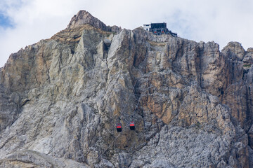 Wall Mural - Passo Falzarego, Italy: gondola cable car reaching the  Lagazuoi hut at an altitude of 2700m (8900ft).Lagazuoi mountain group was part of the front and set of several battles during WWI