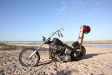 A Motorcycle Parked On The Beach