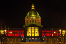 San Francisco City Hall At Night Lit In Red And Gold