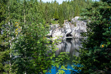 Mountain Lake With Clear Green Water In Granite And Marble Rocks In A Natural Monument