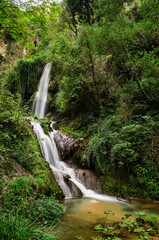 Wall Mural - Waterfall in the gorge of the Aniene river next to the Villa of Manlio Vopisco. Tivoli, Italy