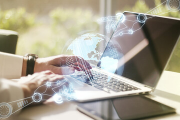 Poster - Double exposure of robotics technology with world map hologram and hands typing on laptop on background. Research and development software concept