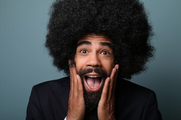 Canvas Print - Beautiful afro man in front of a background