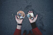 © Sky-Blue Images/Stocksy - Female hands showing seashells