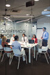 © JELENA JOJIC TOMIC/Stocksy - Business team at the meeting