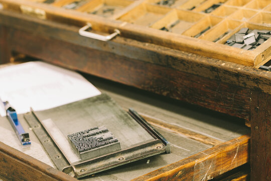 Lead Press Types on a Wooden Desk