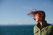© Cherish Bryck/Stocksy - Wind swept hair on the ocean.