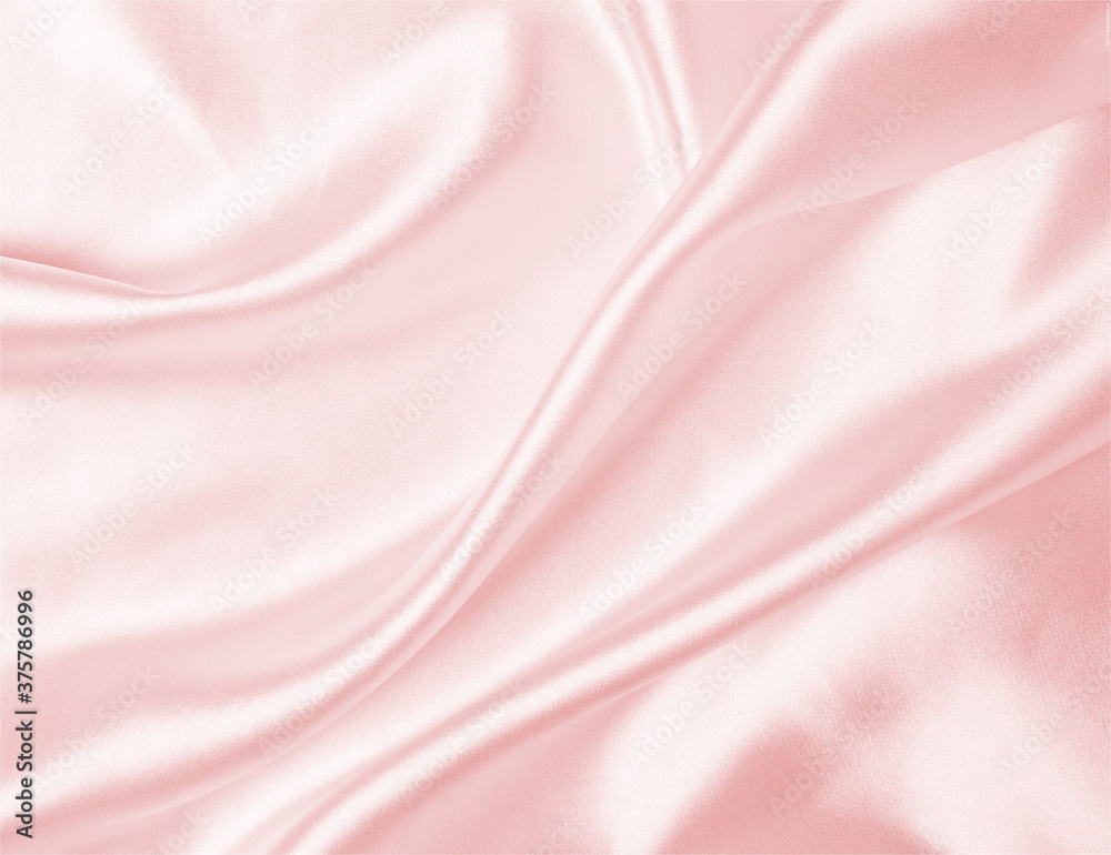 Smooth elegant pink silk or satin luxury cloth texture can use as ...