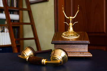 Wall Mural - Closeup shot of a beautiful and vintage wooden telephone captured near the bookshelves