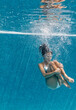 © Felix Hug/Stocksy - Sinking in the water