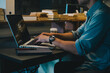 © Marija Savic/Stocksy - Man Working on Laptop