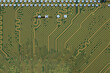 © Wenhai Tang/Stocksy - close-up of electronic circuit golden board background of computer motherboard.